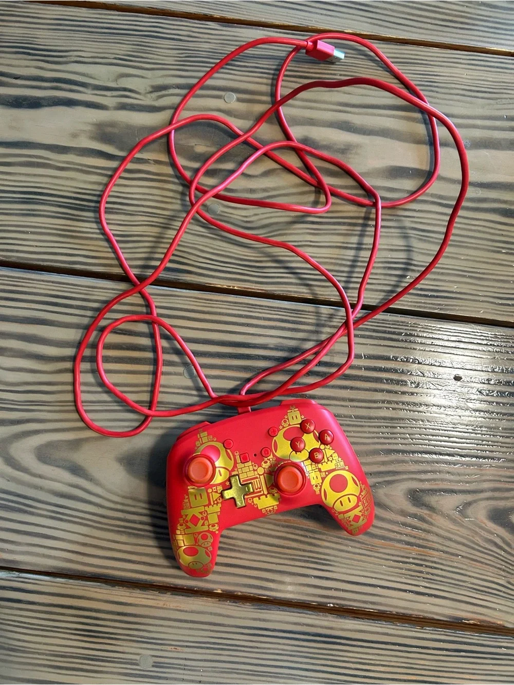 Red and Gold Wired Gaming Controller with Icon Accents